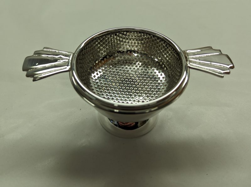 Silver Tea Strainer Cast
